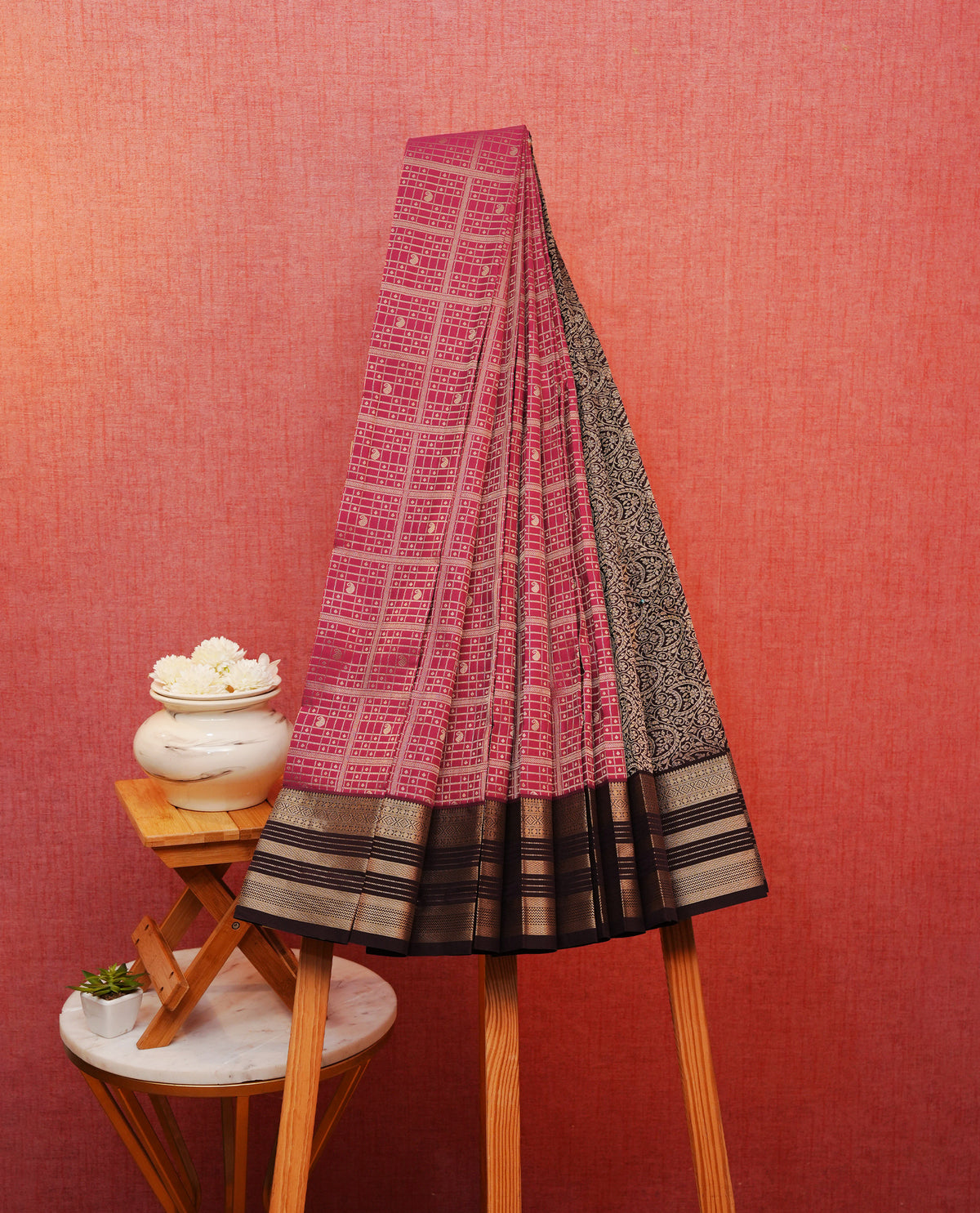 Rose pink colour silk saree featuring gold zari buttas and checks on body, contrast brown with gold zari traditional border, contrast grand pallu comes with matching blouse piece .