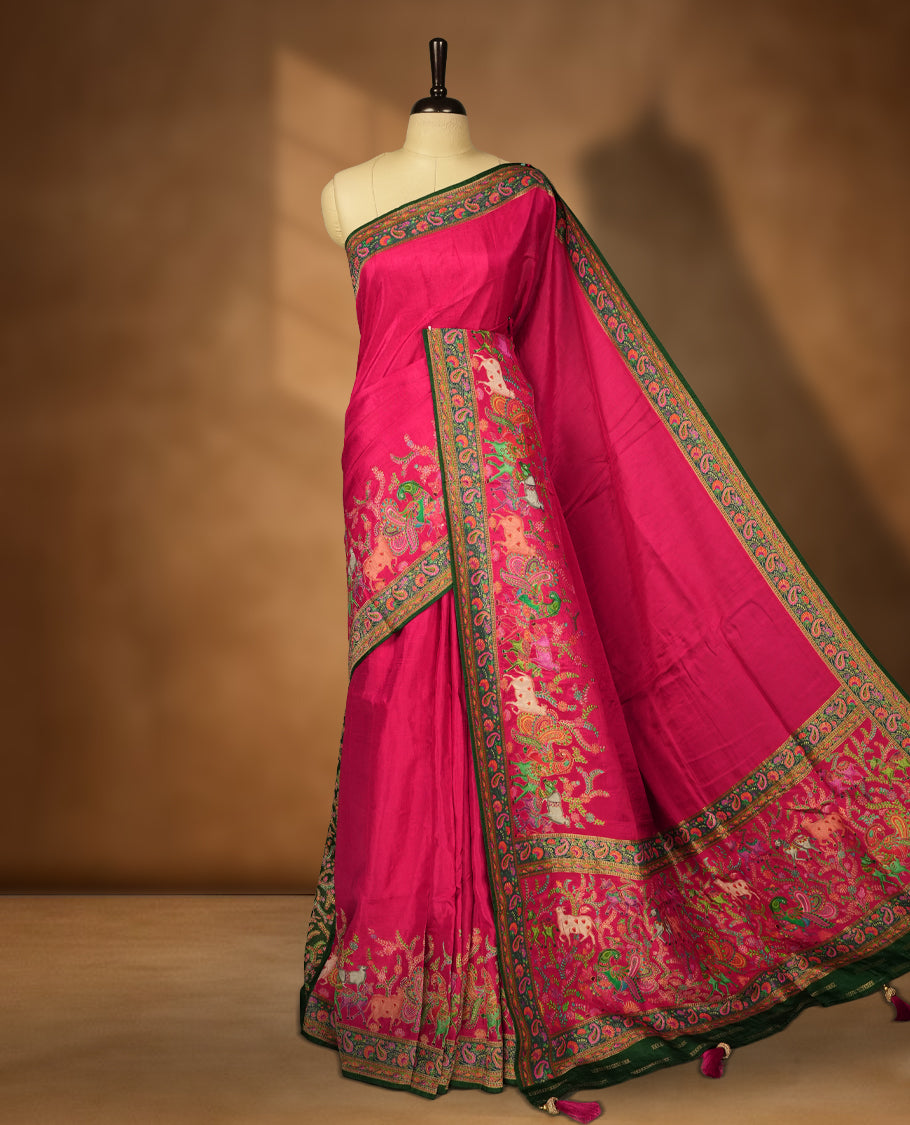 Rani Pink Pashmina Silk Saree with Plain Body, Rich Multicolor Embroidered Elephant and Paisley Motifs on Contrasting Green Zari Border & Pallu, Paired with Matching Blouse Piece