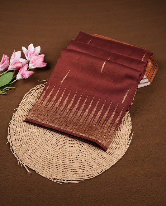 Chocolate Brown colour semi banaras tussar georgette saree featuring antique gold zari buttas on body, temple pattern on border and floral pattern on pallu, paired with matching blouse piece.