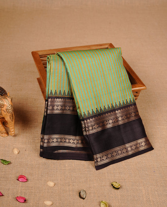 Pastel green & white colour traditional kancheepuram silk saree featuring gold zari check pattern on body, complemented by contrast dark chocolate colour with gold zari traditional border, paired with matching blouse piece.