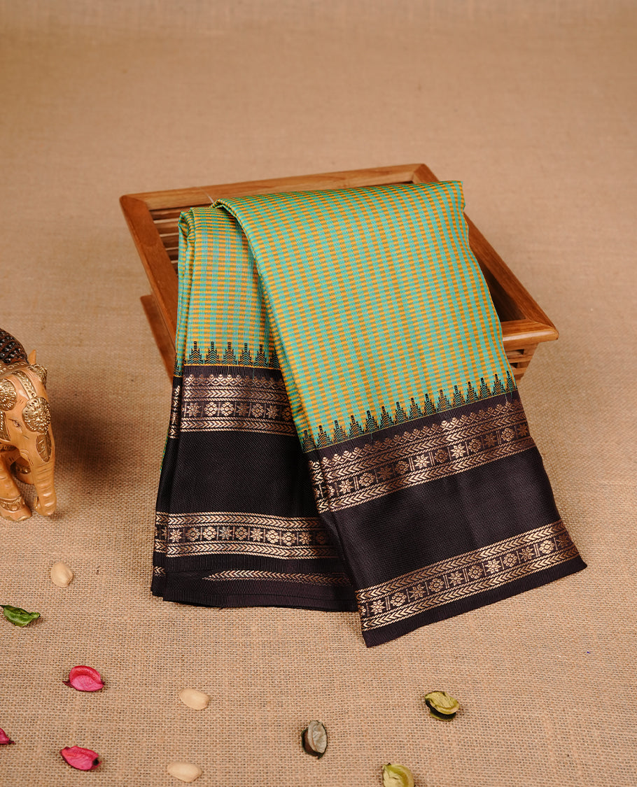 Pastel green & white colour traditional kancheepuram silk saree featuring gold zari check pattern on body, complemented by contrast dark chocolate colour with gold zari traditional border, paired with matching blouse piece.