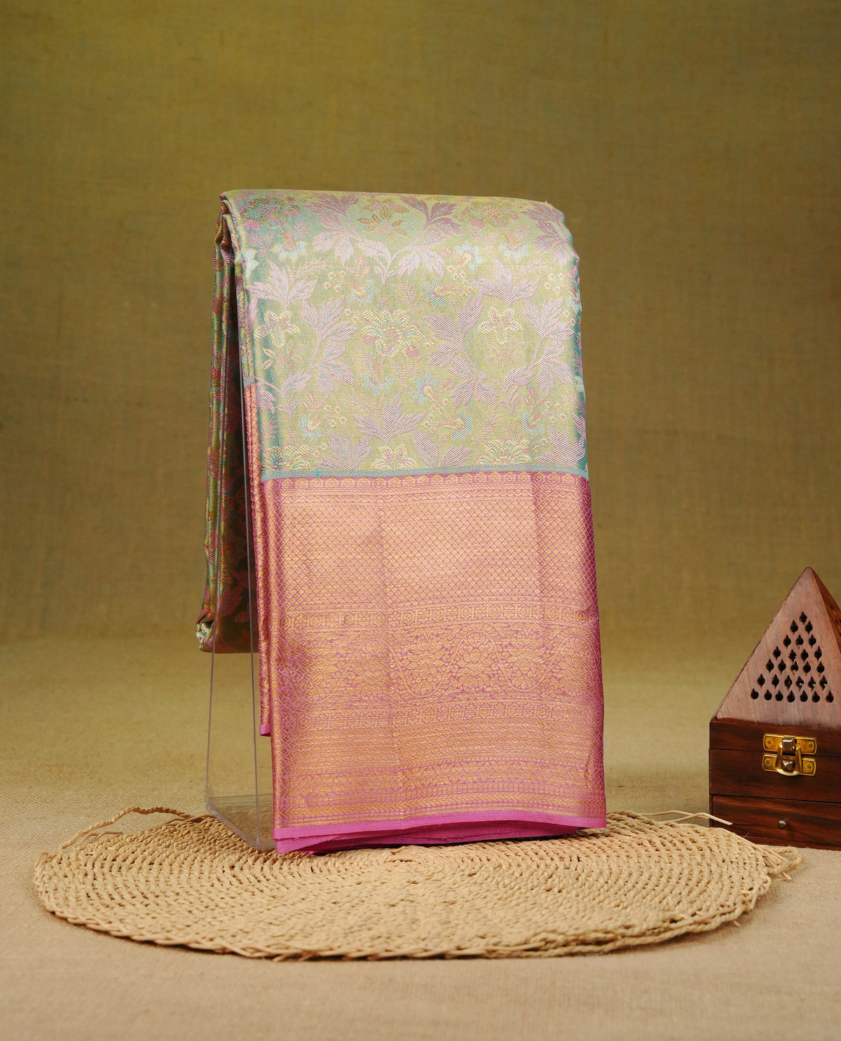 Light gold & blue double shade colour pure tissue silk saree featuring pink zari floral kodi pattern on body, complemented by contrast pink colour with traditional border, comes with matching blouse piece.
