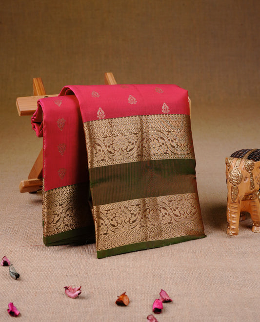 Rani Pink Colour Traditional Kancheepuram Silk Saree with Elegant Gold Zari Buttas on the Body, Enhanced with a Contrast Olive Colour Grand Gold Zari Border and Rich Pallu, Paired with a Matching Blouse Piece
