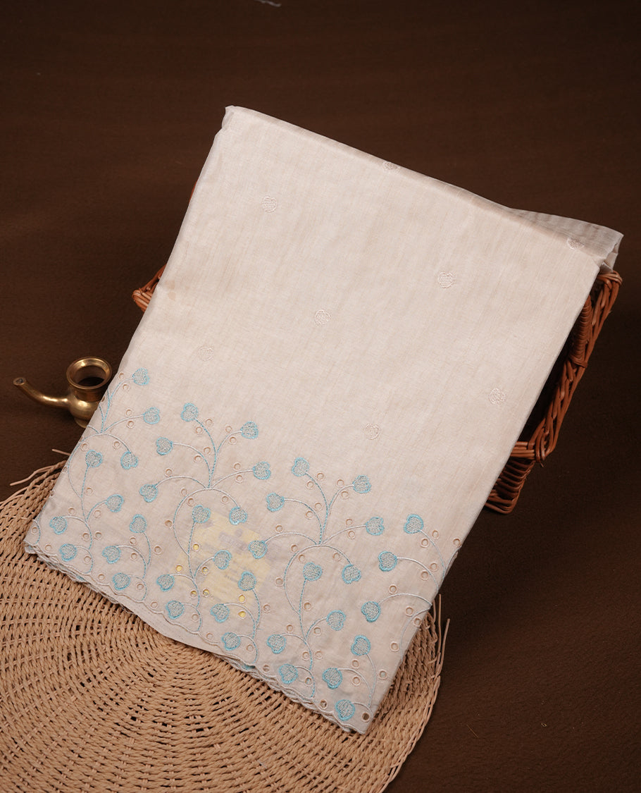 Beige colour Tussar silk saree featuring Elegant plain body, highlighting Blue colour thread floral kodi worked scalp border, pallu and paired with matching blouse piece.