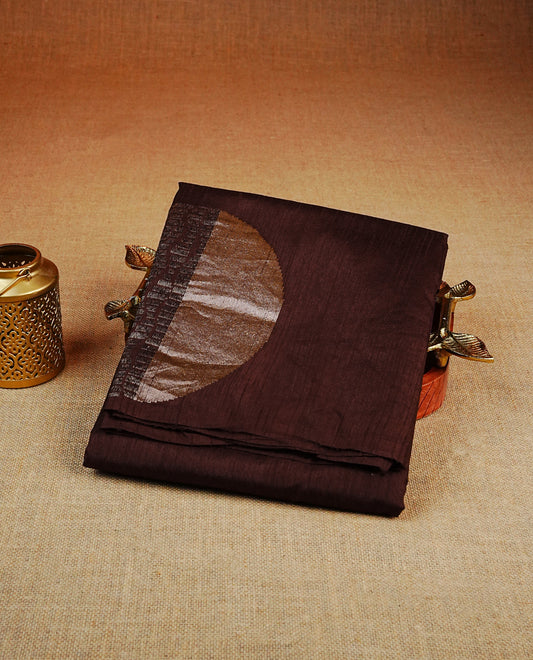 Dark coffee brown colour semi tussar silk saree featuring bold thread polka dot body, no specific border, comes with matching blouse piece