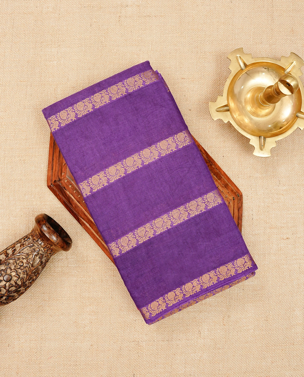 Violet Sungudi cotton saree featuring elegant gold zari striped Peacock pattern across the body, complemented by a contrast border. Paired with a matching blouse piece