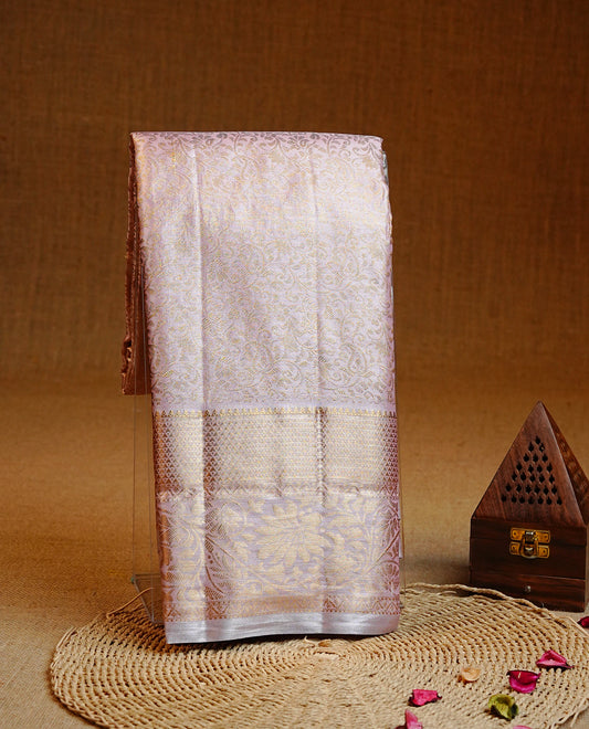 Baby pink colour Semi tissue silk saree featuring gold zari kodi floral motifs on body, Self colour with traditional border, paired with matching blouse piece.