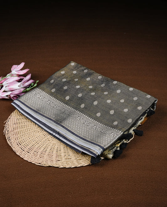 Black colour semi Banaras silk saree featuring with Digital printed body and traditional buttas on border, comes with matching blouse piece.