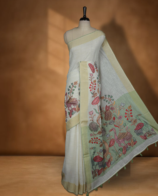 Cream colour cotton linen silk saree featuring Floral  & brids printed pattern on body, golden simple border with green colour pallu and comes with a matching blouse