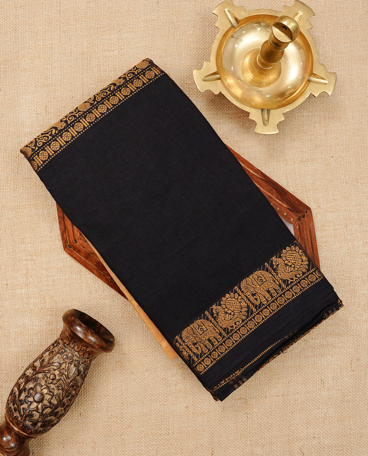 Chococate Brown Colour Sungudi Cotton Saree with gold zari elephant & Peacock motifs on the body, a self zari border, and a rich gold zari pallu. Paired with a Contrast  Mustard orange blouse piece  featuring gold zari work.