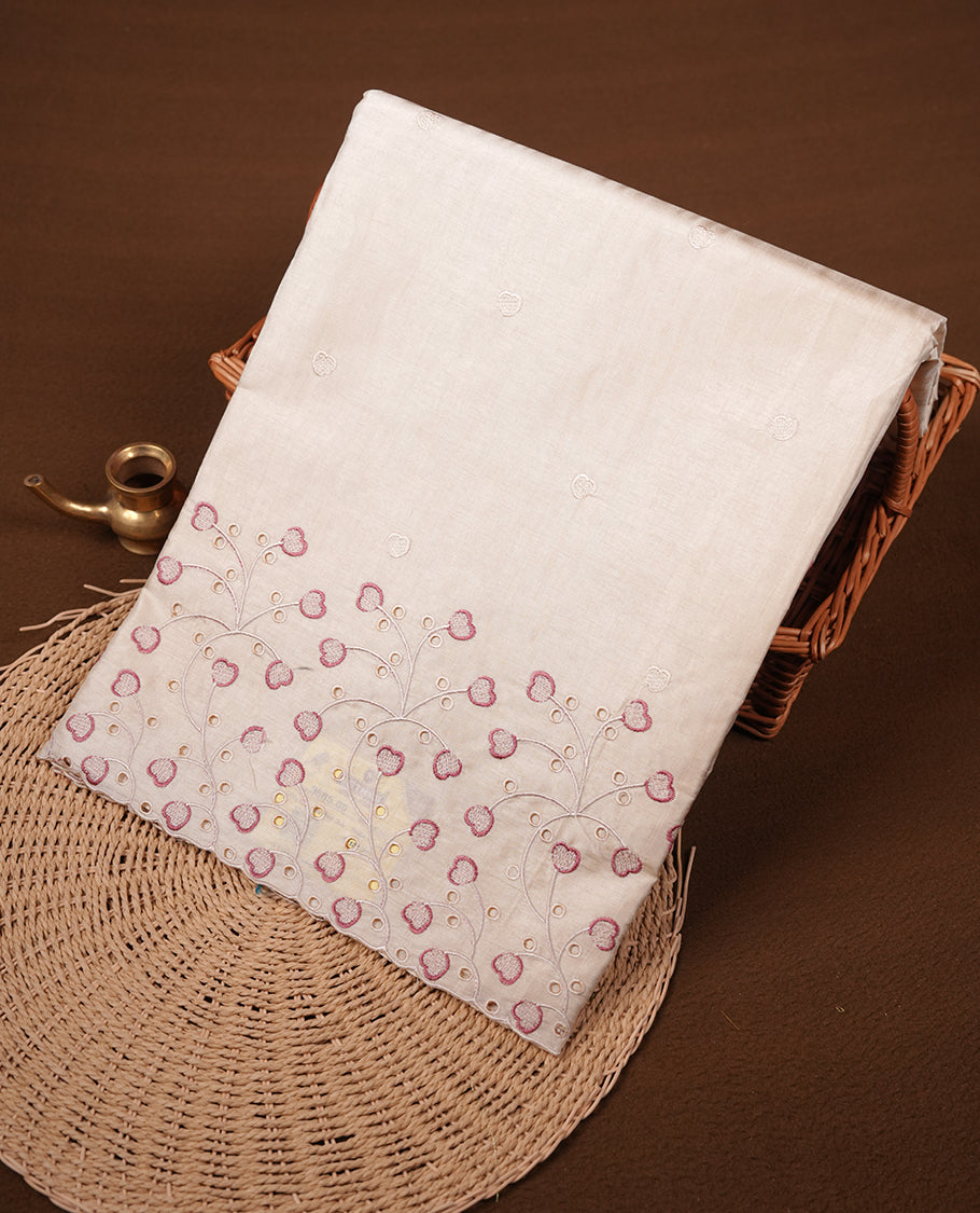 Beige colour Tussar silk saree featuring Elegant plain body, highlighting Mauve colour thread floral kodi worked scalp border, pallu and paired with matching blouse piece.