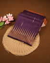 Grape colour semi banaras tussar georgette saree featuring antique gold zari buttas on body, temple pattern on border and floral pattern on pallu, paired with matching blouse piece.