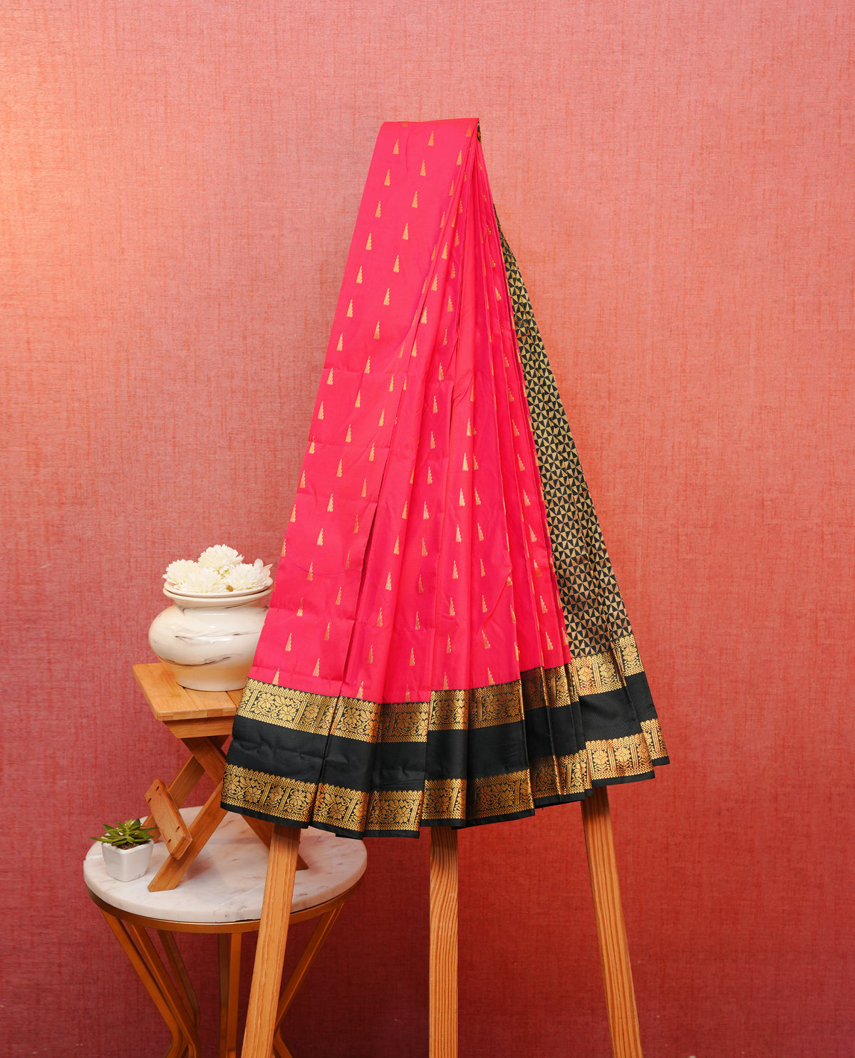 Pink colour silk saree featuring gold zari motifs on body, contrast dark grren with gold zari traditional border, contrast grand pallu comes with matching blouse piece .
