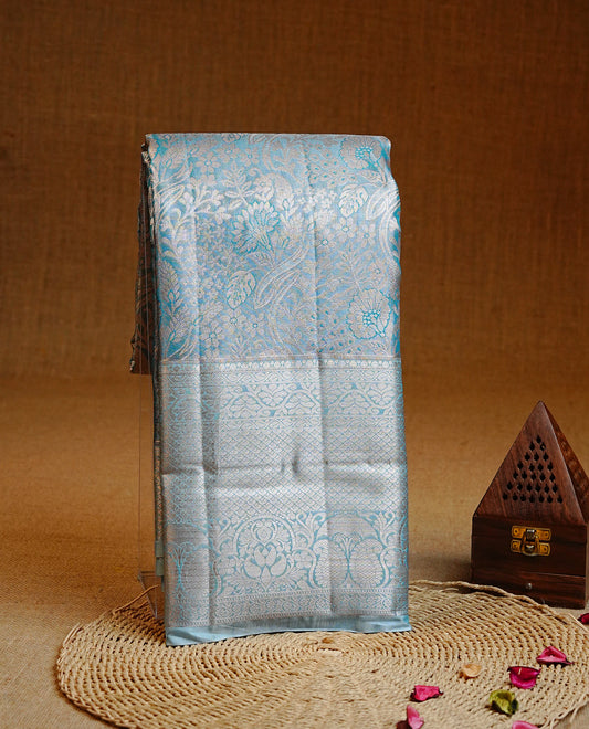 Blue & Gold Double shade Semi Tissue Silk saree featuring Light gold Kodi pattern on body, complemented by Self colour with gold zari border, paired with matching blouse piece.