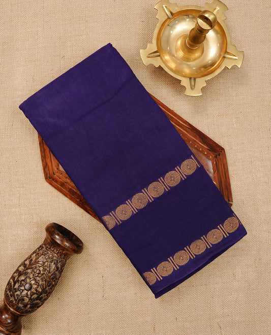 Purple Colour  Sungudi Cotton Saree with gold zari motifs on the body, a matching gold zari border, and a plain pallu. Paired with a contrast Pink colour  blouse piece  featuring a gold zari peacock border.
