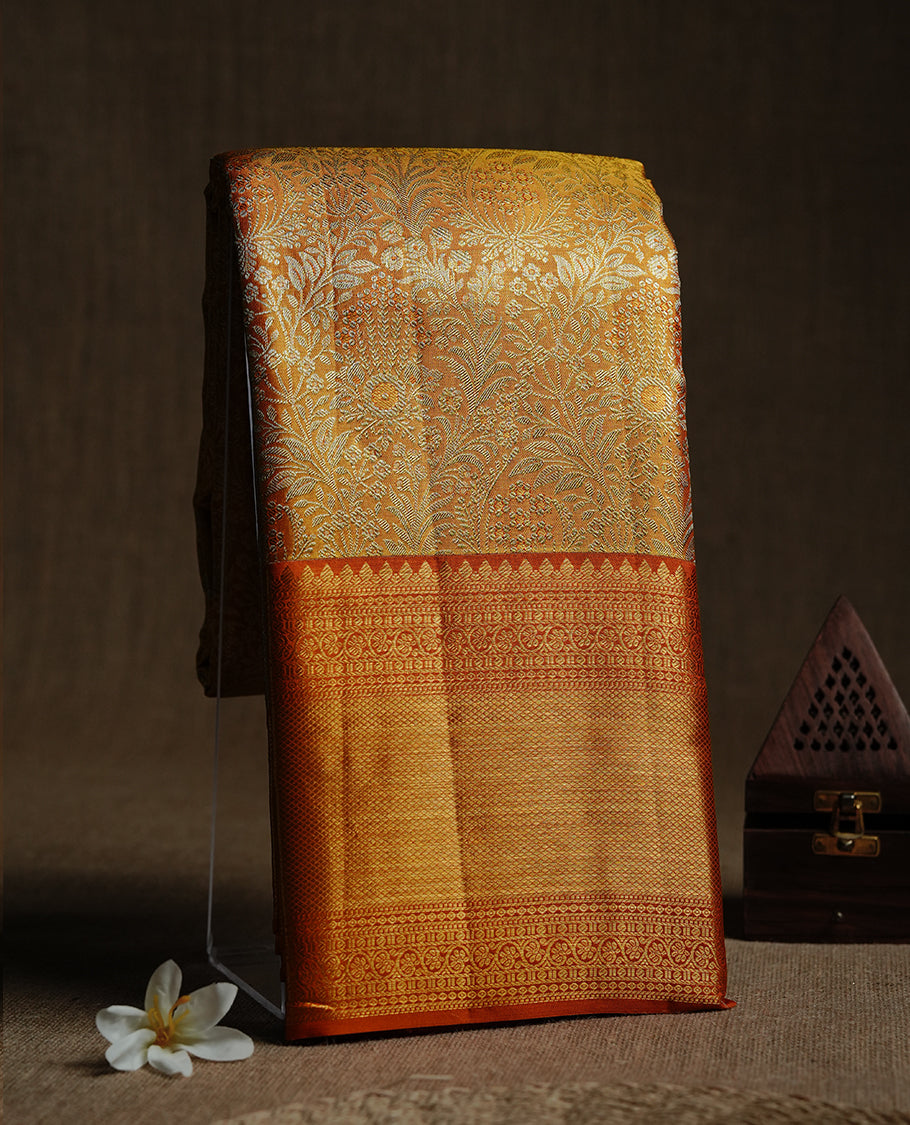 Gold & mustard double shade colour kancheepuram tissue silk saree featuring gold zari floral kodi pattern on body, complemented by contrast mustard colour with traditional border, paired with matching blouse piece.