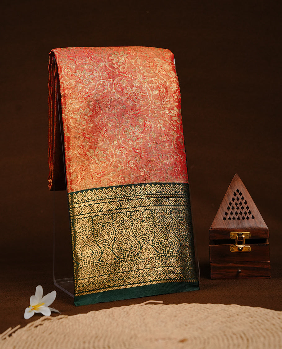 Red & gold double shade colour semi tissue silk saree featuring gold zari floral kodi pattern on body, contrast Green colour with gold zari traditional border, paired with matching blouse piece.