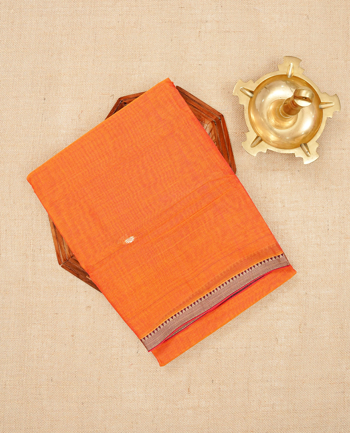 Orange colour Narayanapattu Cotton Saree Featuring  Cream Colour Buttas on body, grey  & maroon colour temple designed  border, contrast striped pallu, Paired with a matching blouse piece.