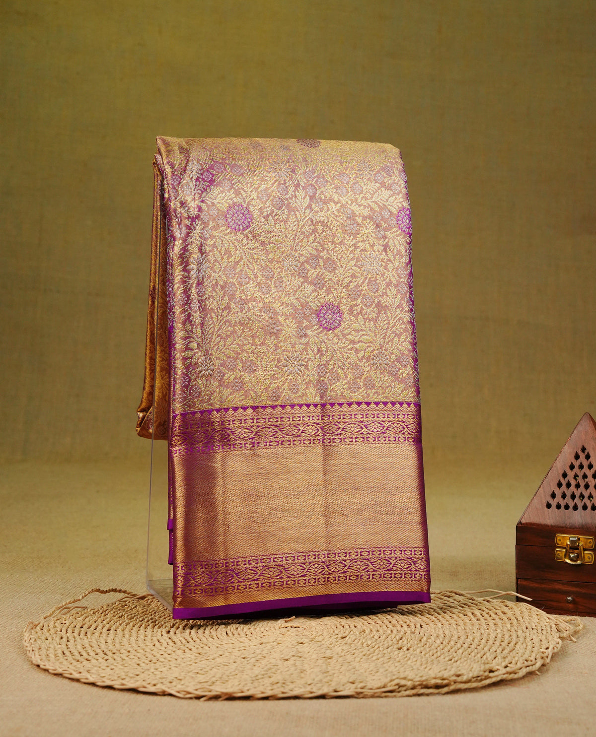 Purple and Gold double shade colour pure tissue silk saree featuring Gold zari floral kodi pattern on body, complemene\ted by contrast Purple colour traditional border, comes with matching blouse piece.