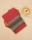 Red Colour  Narayanapattu Cotton Saree featuring a plain body , beautifully complemented by a Green border with maroon & beige colour elephant designs, Contrast pallu, paired with a matching blouse piece.