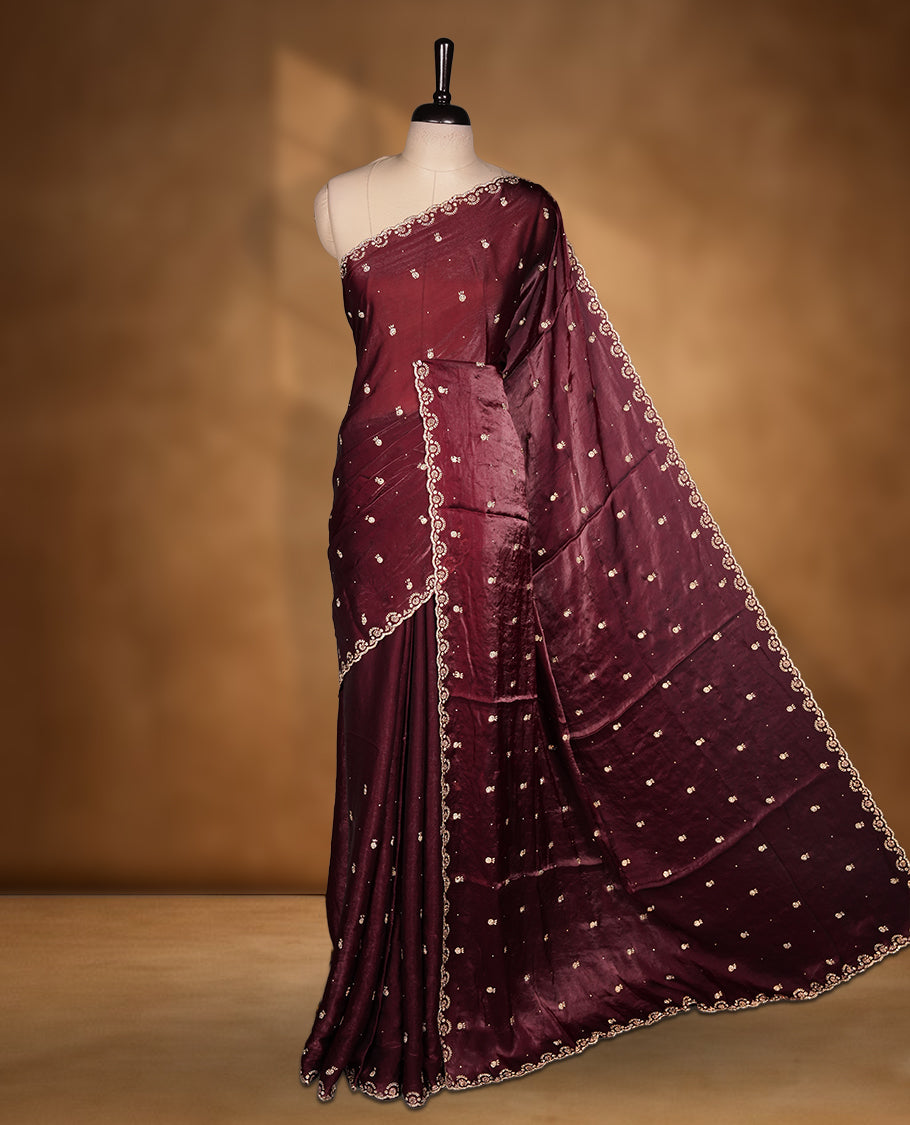 Dark Brown Colour Chiffon Designer Saree featuring Delicate White Stone Work All Over the Body, with Stone Detailing on the Border and Pallu, paired with a Matching Blouse.