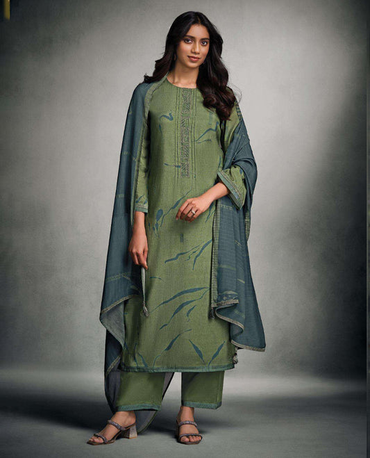 Muted Sage green colour suit material with pakiza silk digital print top with embroidery worked sleeve, paired with matching satin bottom and contrast colour pakiza light weight print with embroidery lace dupatta.