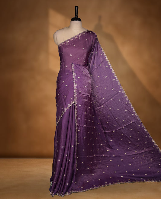 Deep Violet Colour velvet Chiffon Designer Saree featuring Delicate White Stone motifs on Body, with Stone Detailing on the Border and Pallu, paired with a Matching Blouse.