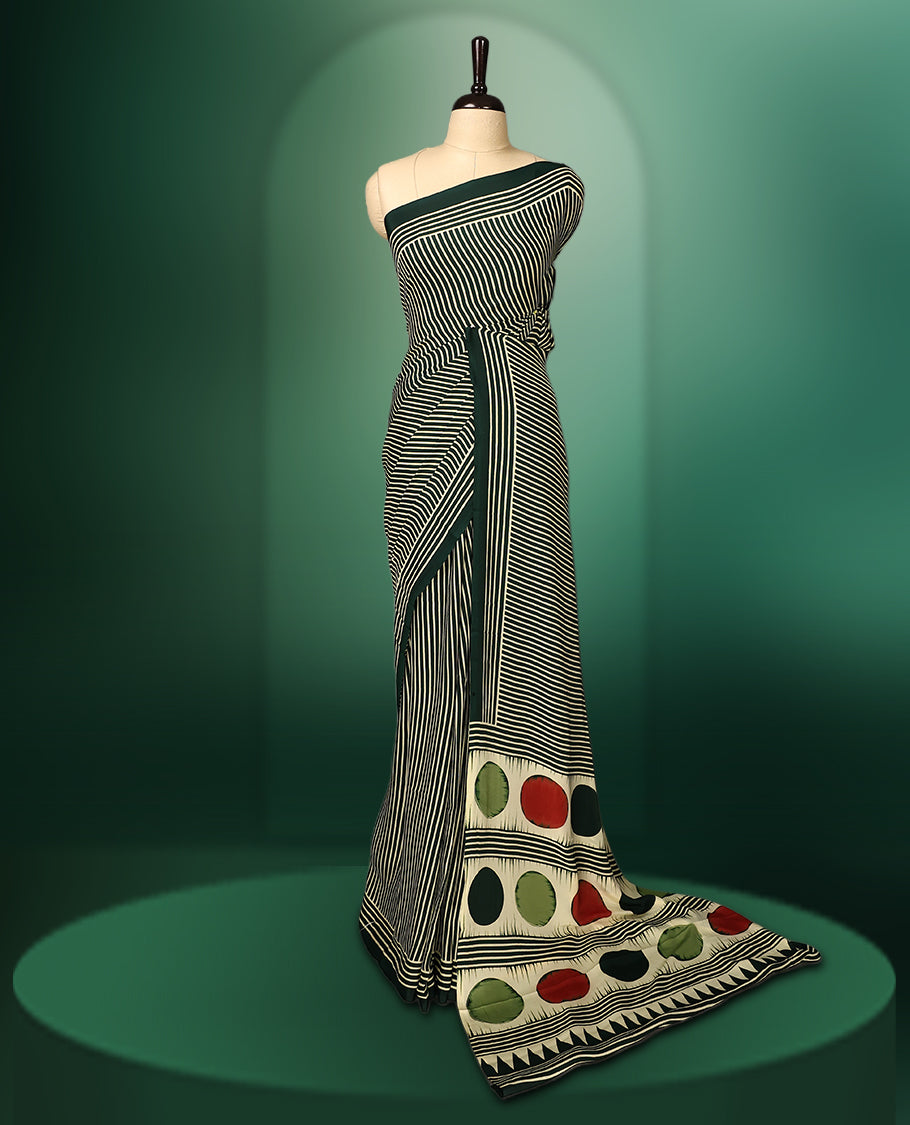 Deep green colour semi modal silk saree featuring elegant cream stripes across the body, complemented by a sleek self colour plain border, and paired with a matching blouse