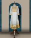 White and soft yellow kurti featuring delicate floral embroidery, a square neckline, 3/4 sleeves, and a flared hem & Perfect for casual outings or festive wear with its breezy, stylish look.