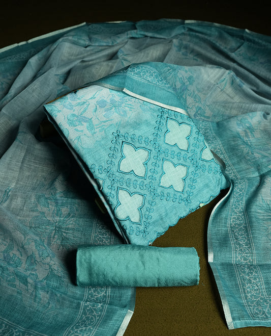 Pastel Aqua blue colour churidhar material featuring cutwork and thread embroidery on the front panel, floral digital printed dupatta with elegant border, and matching plain bottom.