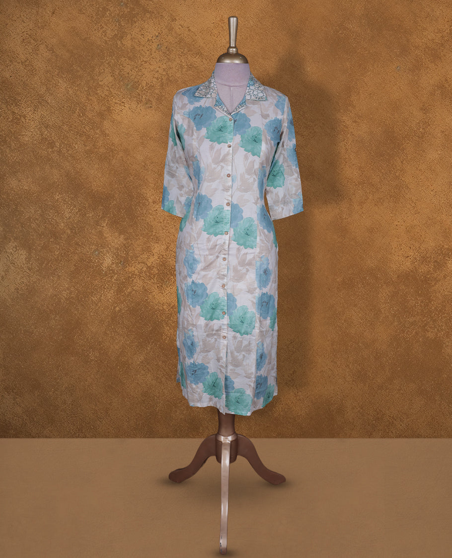Light blue colour button down kurti BY VISMAY with an all over teal and aqua floral print, straight calf length silhouette, classic shirt collar, and elbow length sleeves.