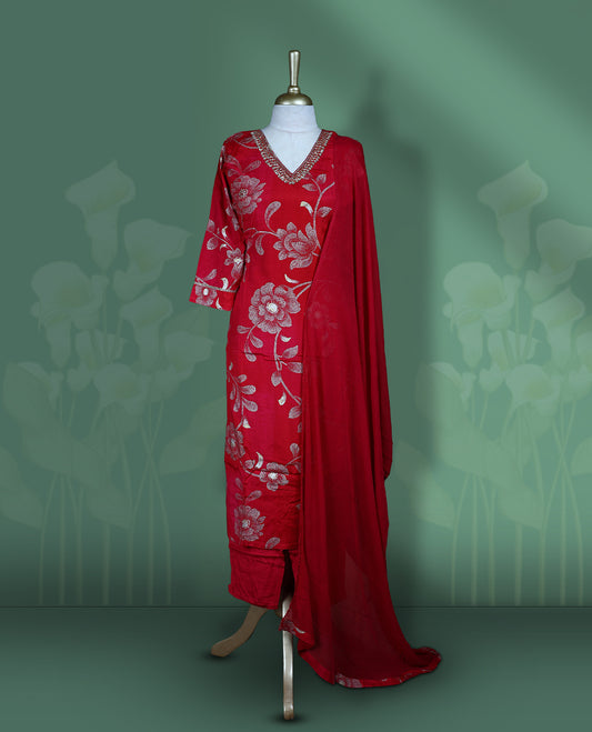 Rani pink colour churidar set featuring elegant white thread & cut beat embroidery on the neckline, sleeves, and gold floral pattern across the body, Paired with a matching plain dupatta