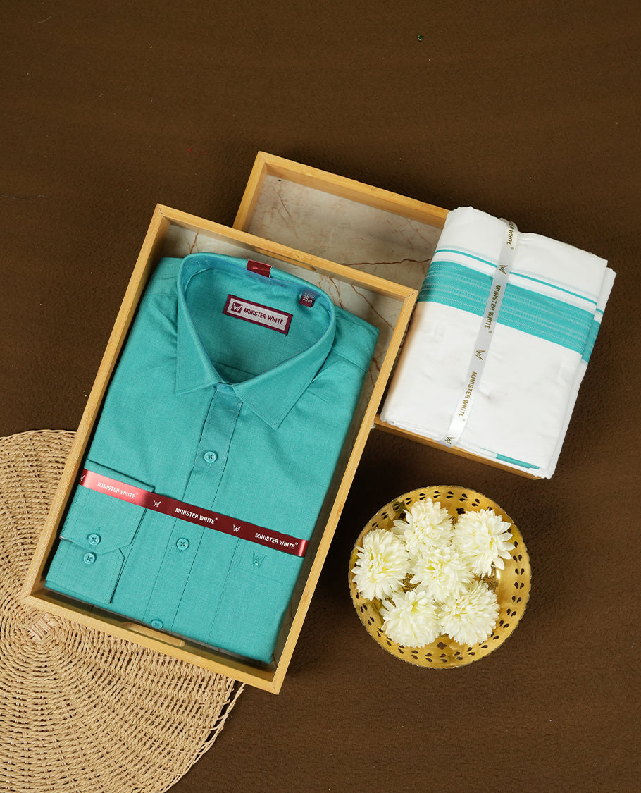 Dark Turquoise colour Minister White traditional men's shirt paired with a matching dhoti with a rose gold border.