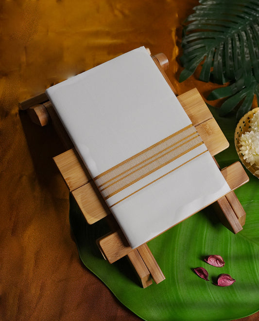 White colour cotton dhoti with classic golden zari borders, perfect for traditional functions, rituals, and festive occasions & A blend of comfort and timeless style for a graceful ethnic look.