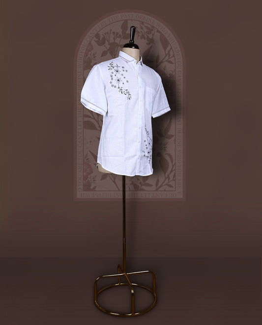 White colour Cotton linen shirt with black colour floral embroidery and smart short sleeves, Lightweight and breathable, perfect for casual or semi formal looks with an artisanal touch.
