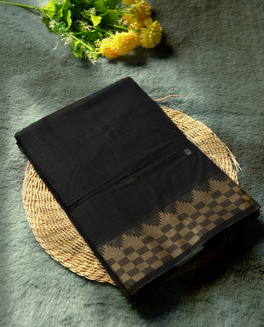 Black colour Narayanapattu cotton saree with floral motifs in the body & pallu featuring traditional temple and checkered motifs in beige colour threadwork, and a matching zari border & this saree comes without a blouse piece.