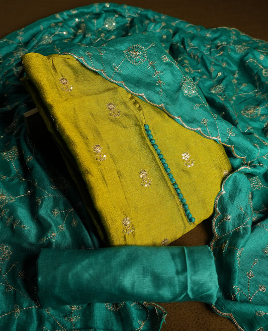 Olive colour churidhar material featuring thread embroidery on the front panel, contrast Green colour dupatta with elegant border, and matching plain bottom