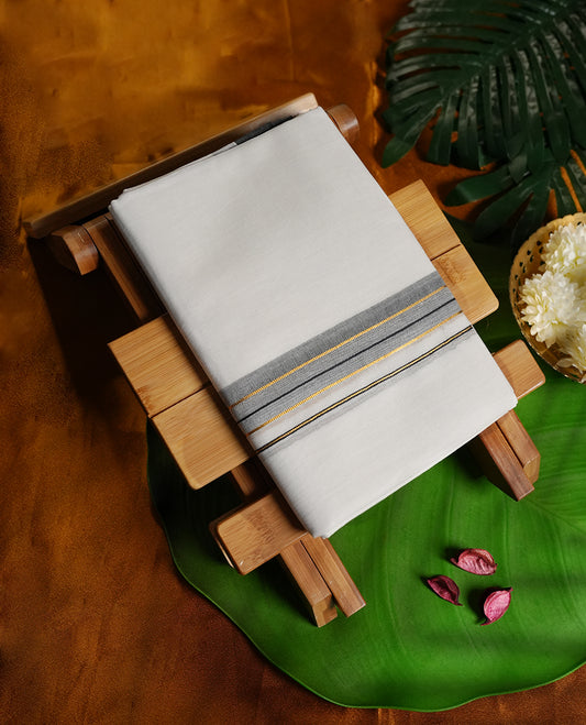 White colour cotton dhoti with a refined grey border, enhanced by golden zari and black stripes & A perfect blend of tradition and style, ideal for weddings, rituals, and festive occasions.