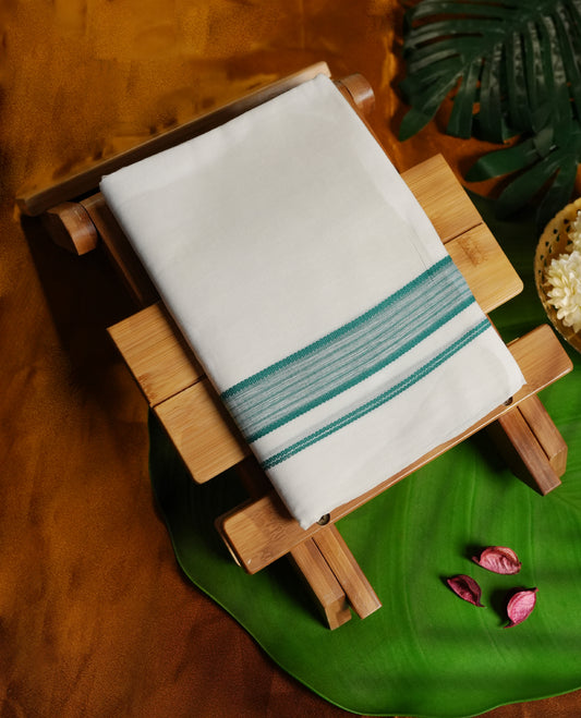 White colour cotton dhoti with a graceful teal border featuring fine stripe detailing, offering a simple yet elegant traditional look & Perfect for rituals, weddings, and festive occasions with timeless charm.