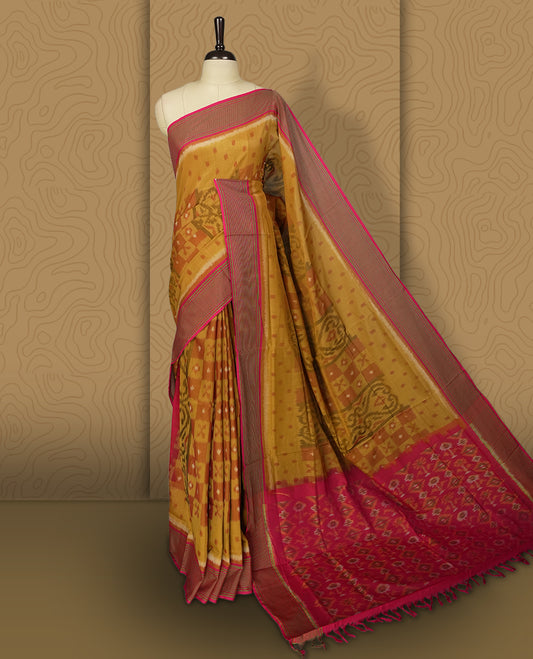 Mustard yellow colour Ikkat Pochampally saree adorned with traditional woven motifs, paired with a striking pink border and pallu, finished with a matching blouse piece for a vibrant and elegant ethnic look.