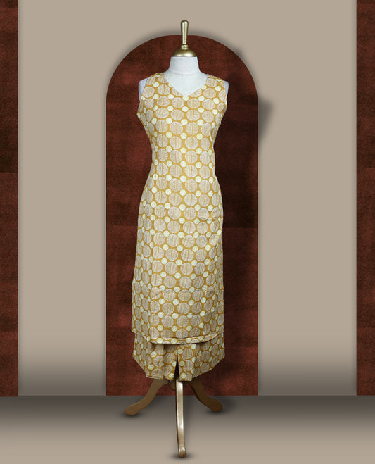 Mustard yellow colour coord set crafted in soft fabric, featuring a sleeveless V neck top with geometric circular prints, paired with a matching straight fit bottom.