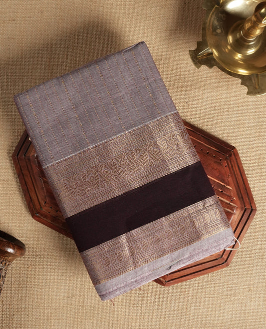 Pastel purple colour Chettinad cotton saree highlighted with subtle golden zari lines on the body, The rich maroon border with intricate golden weaving & Comes with a matching blouse piece.