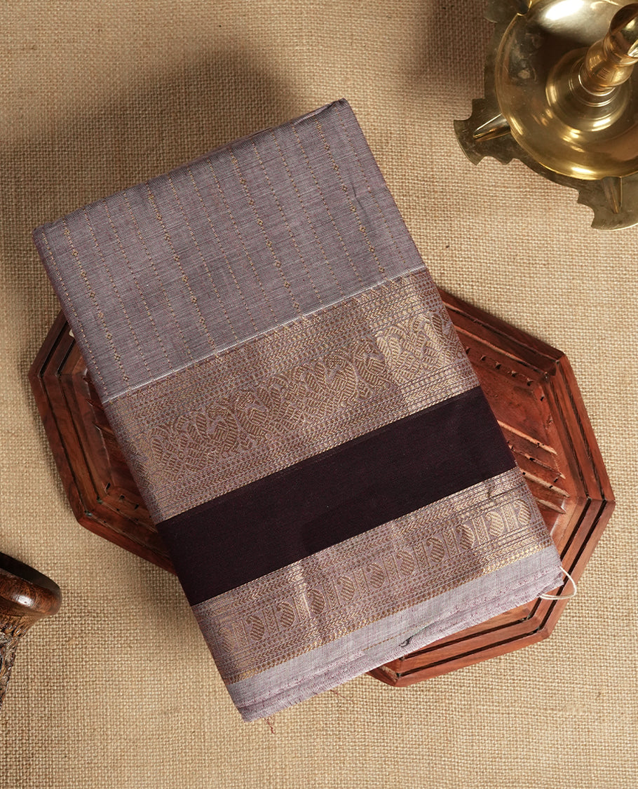 Pastel purple colour Chettinad cotton saree highlighted with subtle golden zari lines on the body, The rich maroon border with intricate golden weaving & Comes with a matching blouse piece.