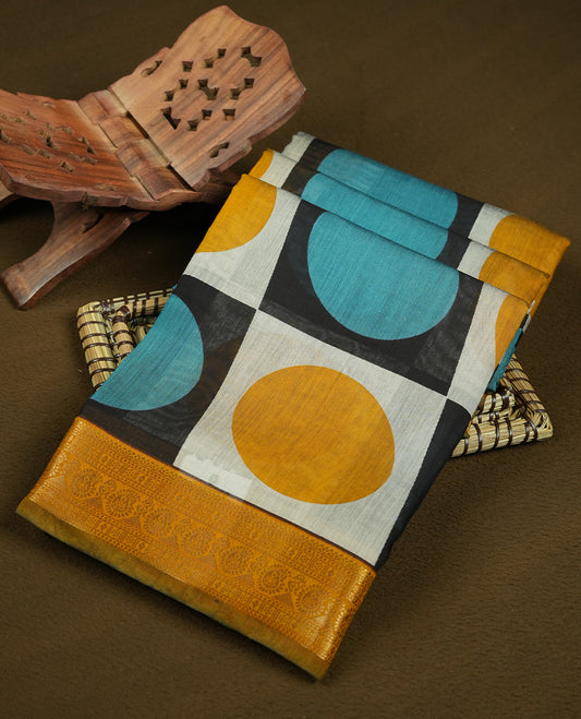 Multicolor mixed chanderi cotton saree with mustard-yellow and turquoise circles on checkerboard squares, golden zari border with floral motifs, geometric pallu, and matching blouse