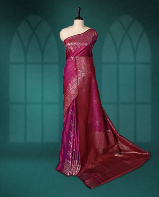 Pink colour semi silk saree featuring intricate golden zari floral motifs across the body, complemented by a rich maroon woven border and pallu, paired with a matching blouse.