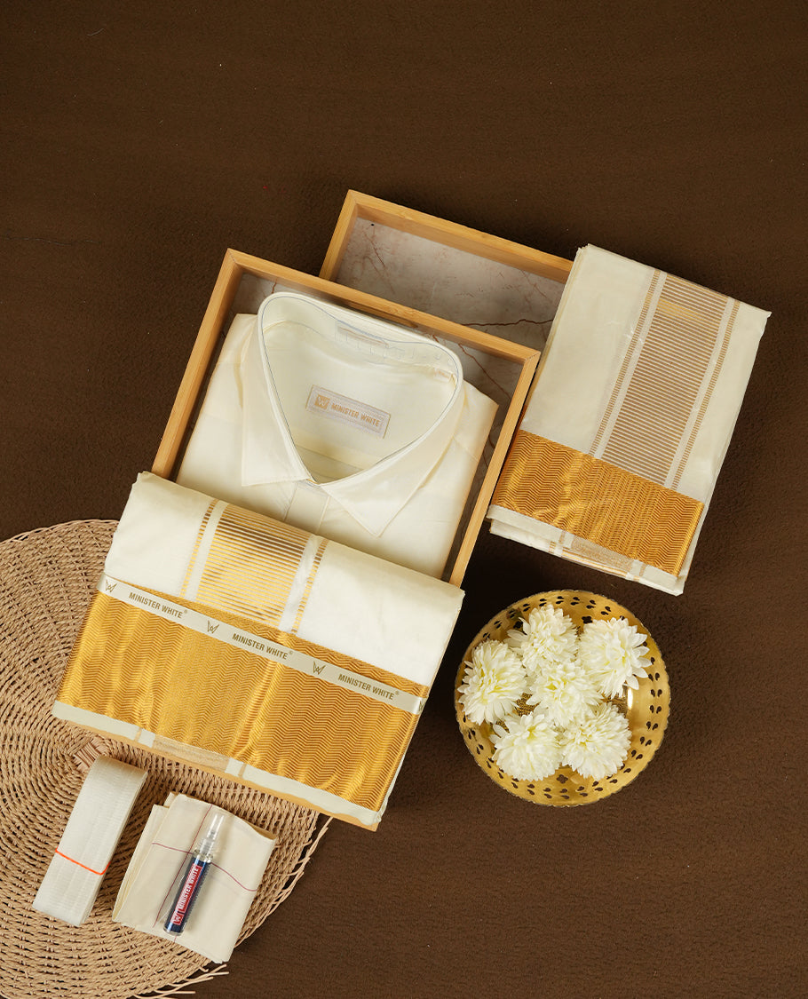 Cream Gold coloured silk wedding shirt, dhoti, and towel set from MINISTER WHITE, featuring a gold zari border.