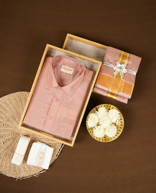 Copper colour Aswin’s wedding set featuring a refined silk shirt and matching dhoti with gold zari detailing, crafted for timeless elegance and perfect for traditional weddings and festive occasions.