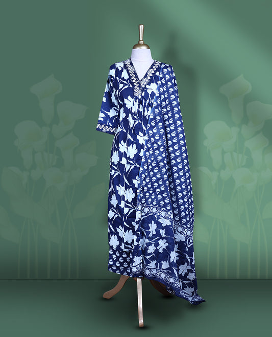 Dark blue colour churidar set featuring elegant white mirror on the neckline, sleeves, and white printed pattern across the body, Paired with a matching printed dupatta