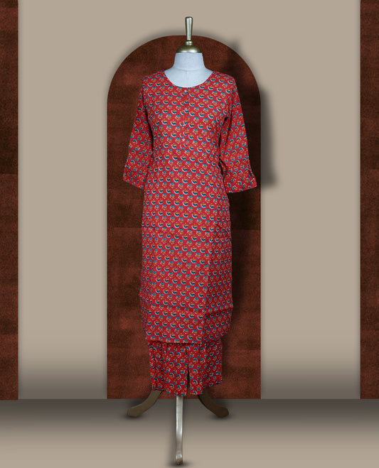 Red colour coord set adorned with all over floral prints, featuring a straight cut kurta with round neckline and 3/4th sleeves, paired with matching bottoms.
