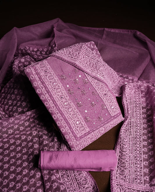 Purple Churidar Material featuring Intricate Thread Embroidery with Mirror and Cut Beads Work on the Front Panel, paired with an All Over Embroidered Net Dupatta and Matching Bottom